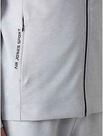 Conjunto de hombre de sudadera con cuello con cremallera y pantalón tommy