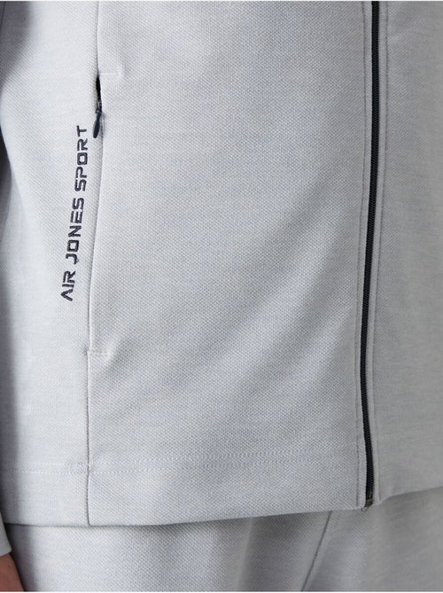 Conjunto de hombre de sudadera con cuello con cremallera y pantalón tommy - Kiabi Conjunto de hombre de sudadera con cuello con cremallera y pantalón tommy - Kiabi