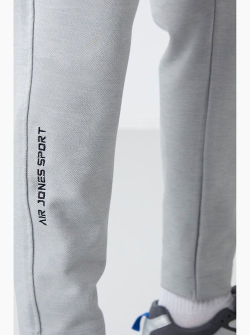 Conjunto de hombre de sudadera con cuello con cremallera y pantalón tommy - Kiabi Conjunto de hombre de sudadera con cuello con cremallera y pantalón tommy - Kiabi