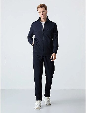Conjunto de hombre de sudadera con cuello con cremallera y pantalón tommy
