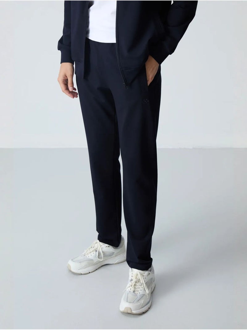 Conjunto de hombre de sudadera con cuello con cremallera y pantalón tommy Negro - Kiabi