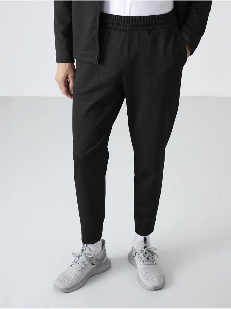 Conjunto de hombre de sudadera con cuello con cremallera y pantalón tommy Negro - Kiabi