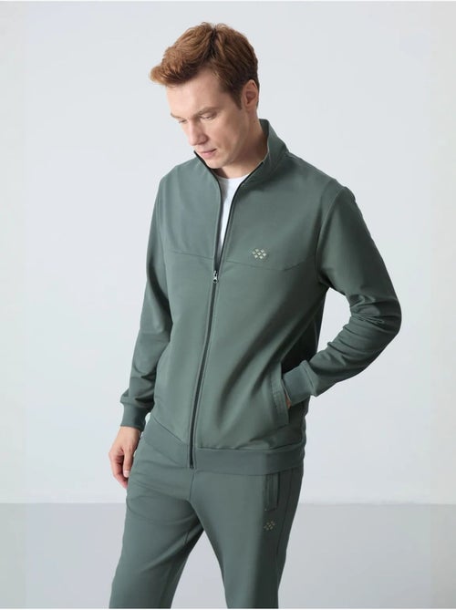 Conjunto de hombre de sudadera con cuello con cremallera y pantalón tommy - Kiabi Conjunto de hombre de sudadera con cuello con cremallera y pantalón tommy - Kiabi