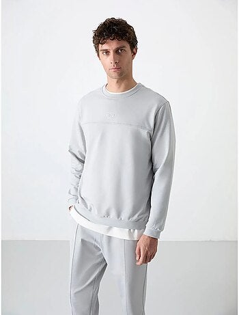 Conjunto de hombre de sudadera de forro polar y pantalón tommy
