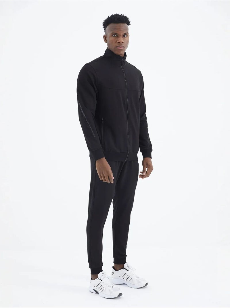 Conjunto de hombre de sudadera de forro polar y pantalón tommy Negro - Kiabi
