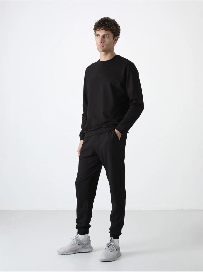 Conjunto de hombre de sudadera de forro polar y pantalón tommy Negro - Kiabi