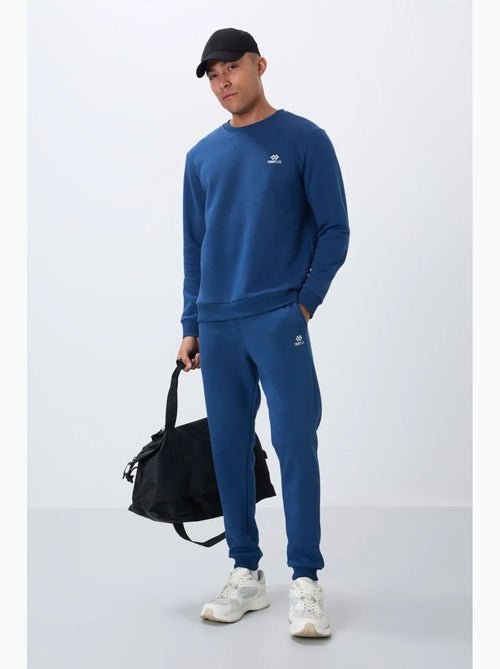 Conjunto de hombre de sudadera y pantalón de felpa de algodón y poliéster tommy - Kiabi