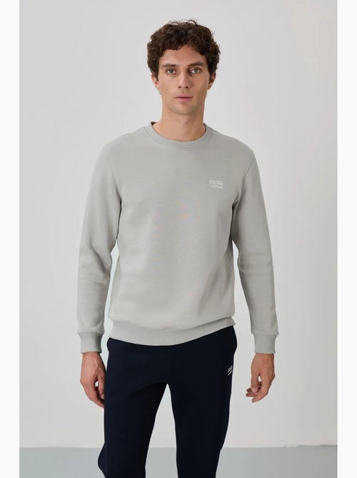 Conjunto de hombre de sudadera y pantalón de felpa de algodón y poliéster tommy - Kiabi Conjunto de hombre de sudadera y pantalón de felpa de algodón y poliéster tommy - Kiabi