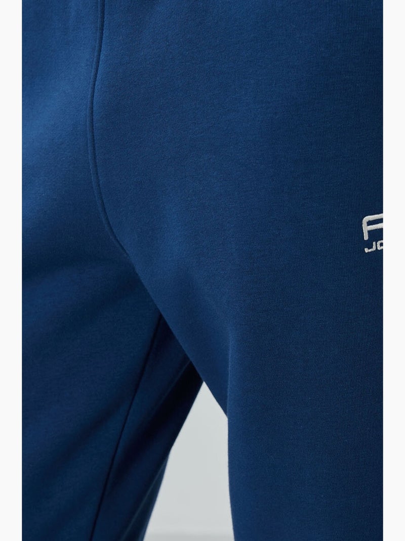 Conjunto de hombre de sudadera y pantalón de felpa de algodón y poliéster tommy Blanco - Kiabi