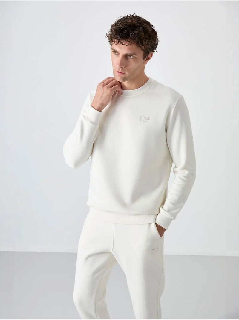 Conjunto de hombre de sudadera y pantalón de felpa de algodón y poliéster tommy Blanco roto - Kiabi