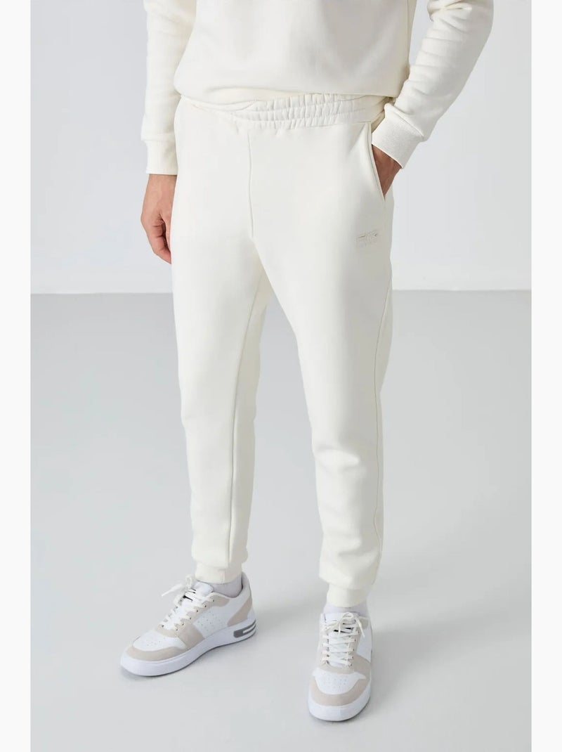 Conjunto de hombre de sudadera y pantalón de felpa de algodón y poliéster tommy Blanco roto - Kiabi