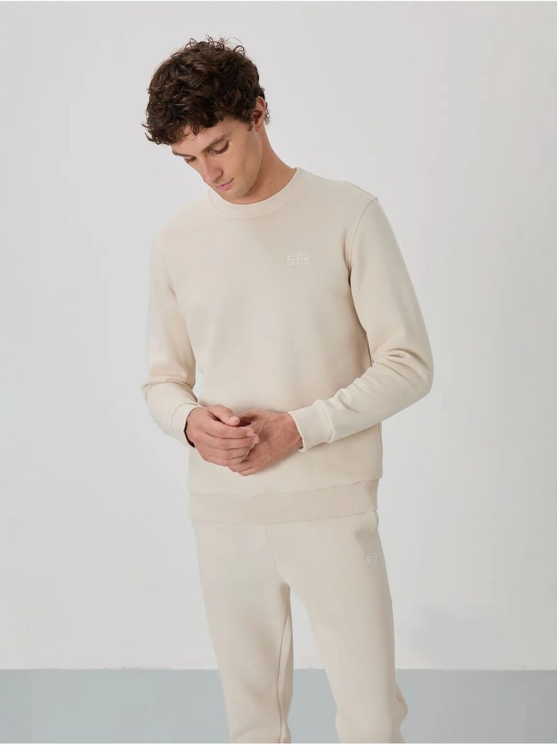 Conjunto de hombre de sudadera y pantalón de felpa de algodón y poliéster tommy Crudo - Kiabi