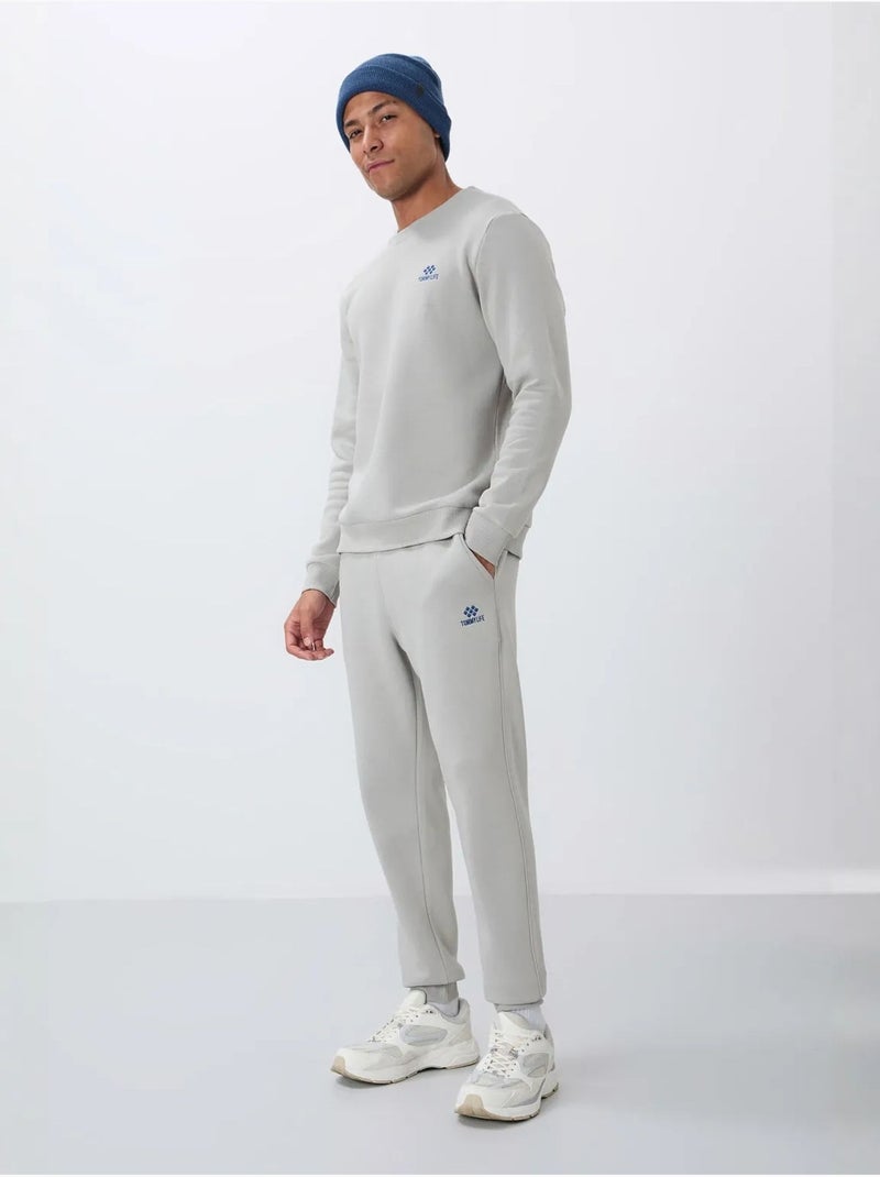 Conjunto de hombre de sudadera y pantalón de felpa de algodón y poliéster tommy Gris claro - Kiabi