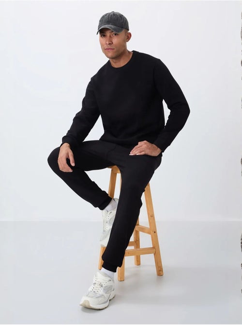Conjunto de hombre de sudadera y pantalón de felpa de algodón y poliéster tommy - Kiabi Conjunto de hombre de sudadera y pantalón de felpa de algodón y poliéster tommy - Kiabi