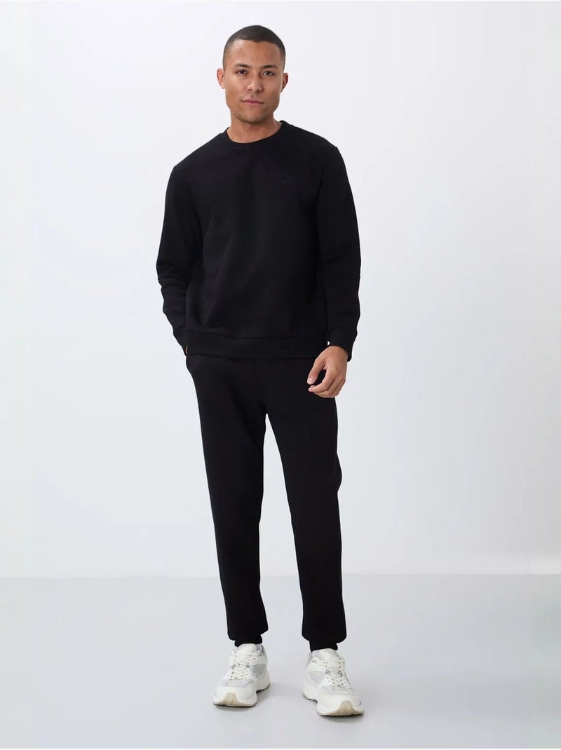 Conjunto de hombre de sudadera y pantalón de felpa de algodón y poliéster tommy Negro - Kiabi