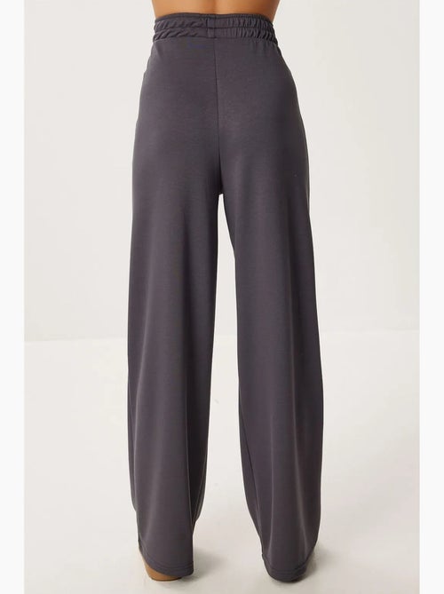 Conjunto de pantalón ancho acanalado con bloques de color istanbul - Kiabi Conjunto de pantalón ancho acanalado con bloques de color istanbul - Kiabi