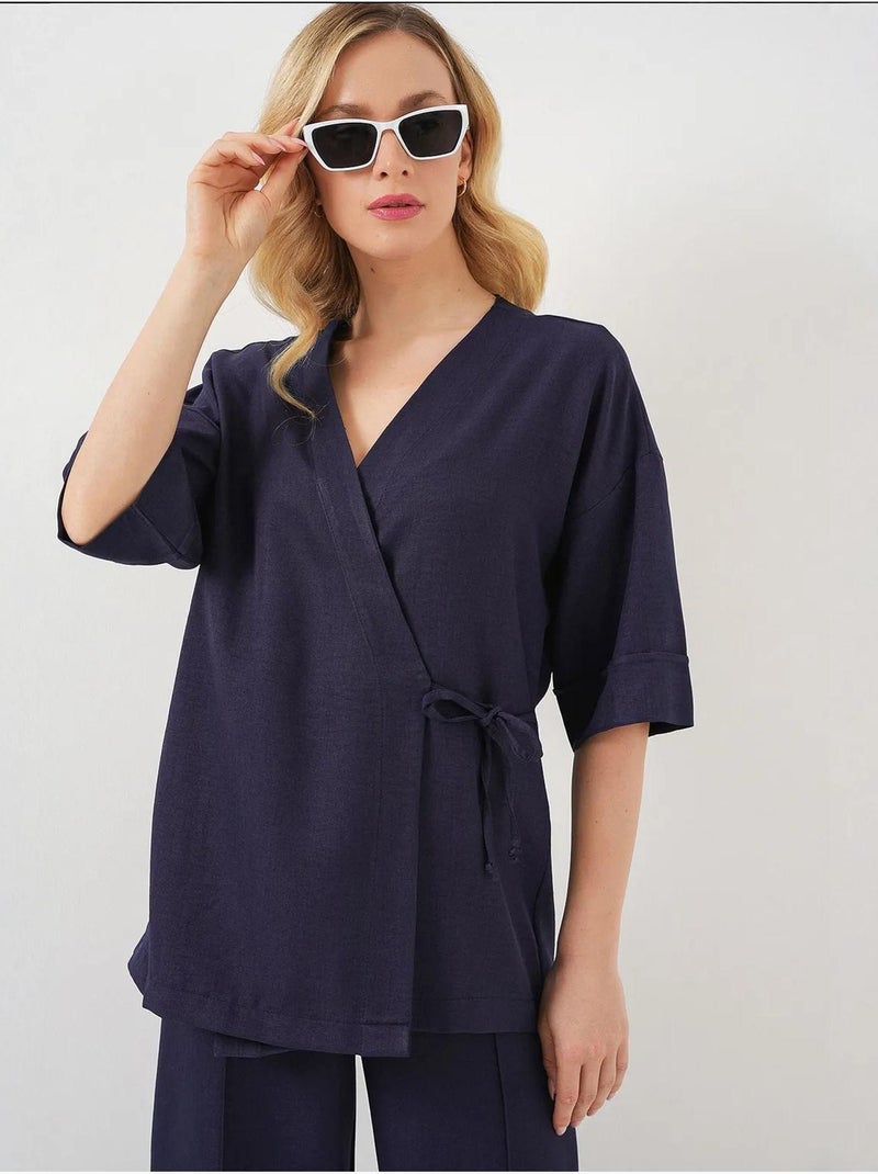 Conjunto de pantalón kimono con cuello en v extragrande y cierre de lazo bdart Azul marino - Kiabi