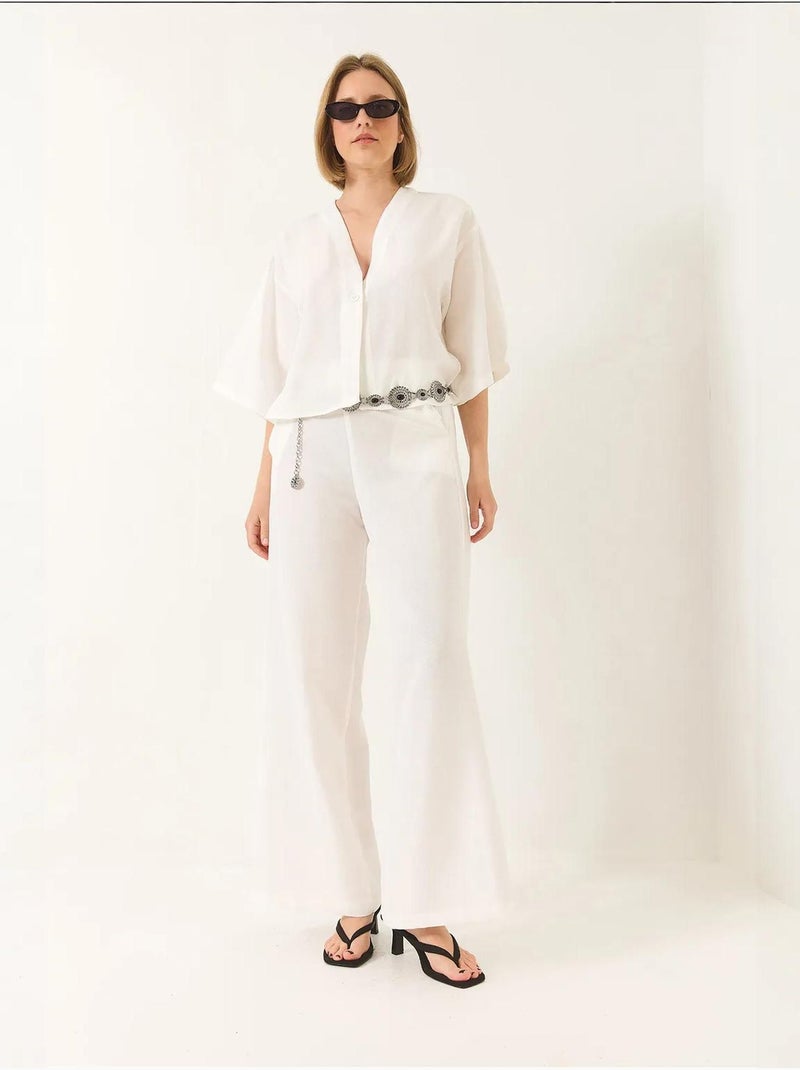 Conjunto de pantalón kimono palazzo de lino con mangas murciélago y cuello en v lucci Blanco - Kiabi