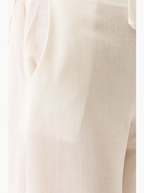Conjunto de pantalón kimono palazzo de lino con mangas murciélago y cuello en v lucci - Kiabi Conjunto de pantalón kimono palazzo de lino con mangas murciélago y cuello en v lucci - Kiabi
