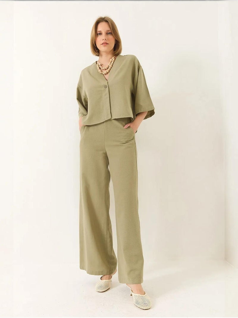 Conjunto de pantalón kimono palazzo de lino con mangas murciélago y cuello en v lucci Verde pastel - Kiabi