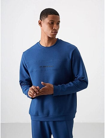 Conjunto de sudadera y pantalón de forro polar estampado tommy