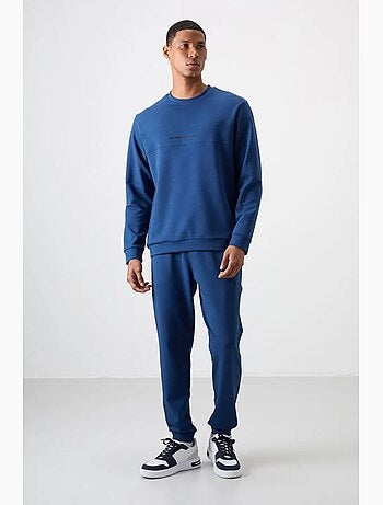 Conjunto de sudadera y pantalón de forro polar estampado tommy