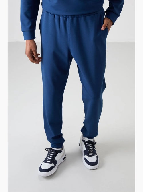 Conjunto de sudadera y pantalón de forro polar estampado tommy - Kiabi Conjunto de sudadera y pantalón de forro polar estampado tommy - Kiabi