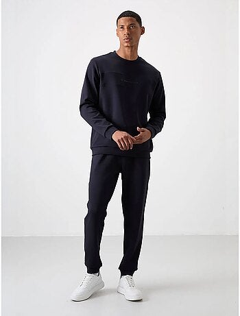Conjunto de sudadera y pantalón de forro polar estampado tommy