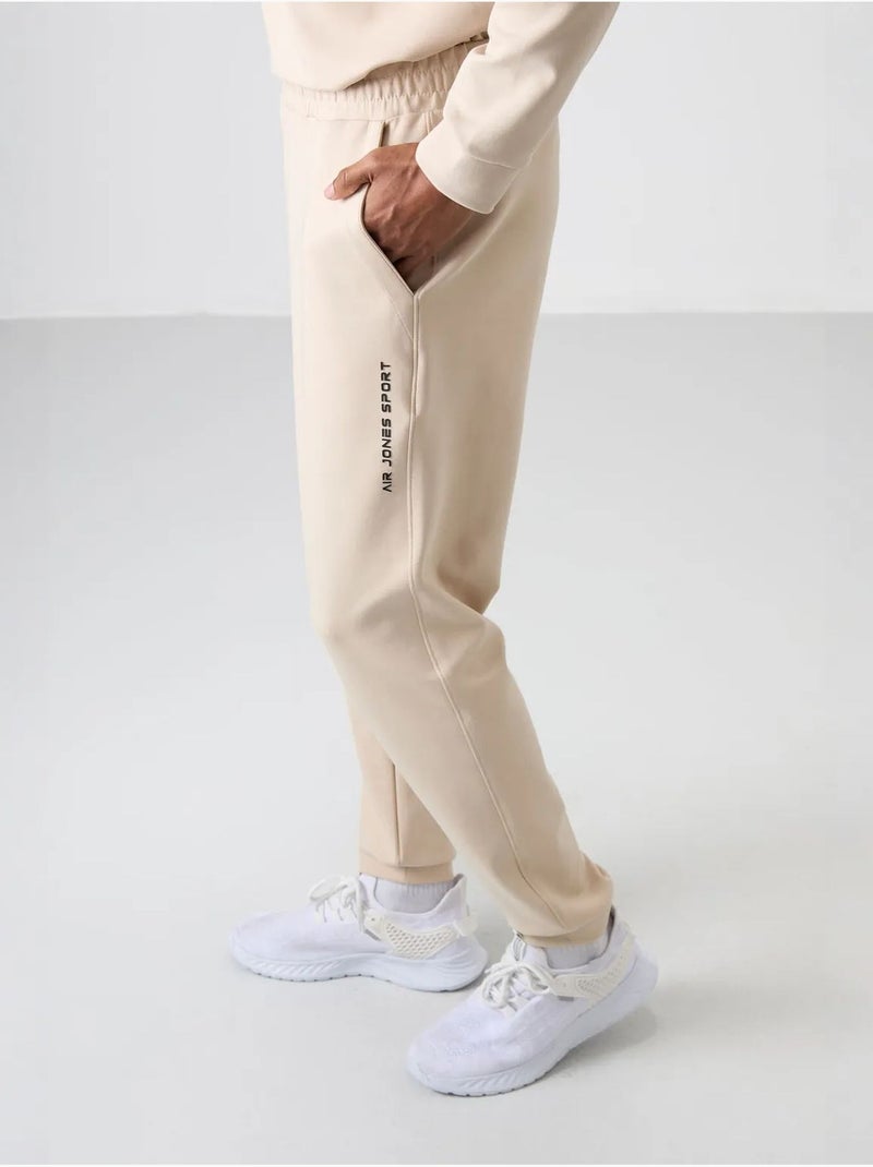 Conjunto de sudadera y pantalón de forro polar estampado tommy Beige arcilla - Kiabi