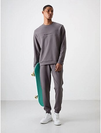 Conjunto de sudadera y pantalón de forro polar estampado tommy