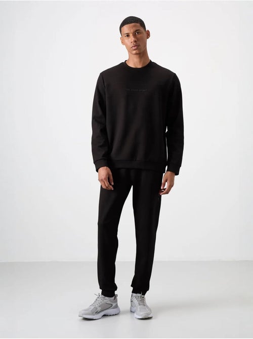 Conjunto de sudadera y pantalón de forro polar estampado tommy - Kiabi Conjunto de sudadera y pantalón de forro polar estampado tommy - Kiabi