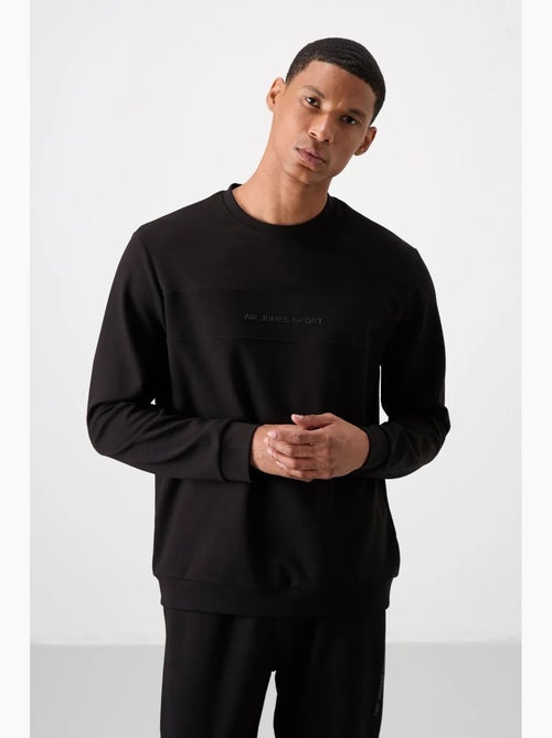 Conjunto de sudadera y pantalón de forro polar estampado tommy - Kiabi Conjunto de sudadera y pantalón de forro polar estampado tommy - Kiabi