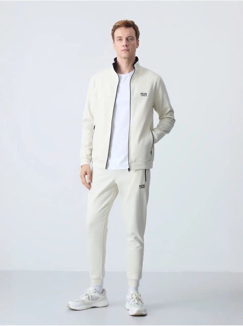 Conjunto de sudadera y pantalón de forro polar para hombre tommy - Kiabi Conjunto de sudadera y pantalón de forro polar para hombre tommy - Kiabi