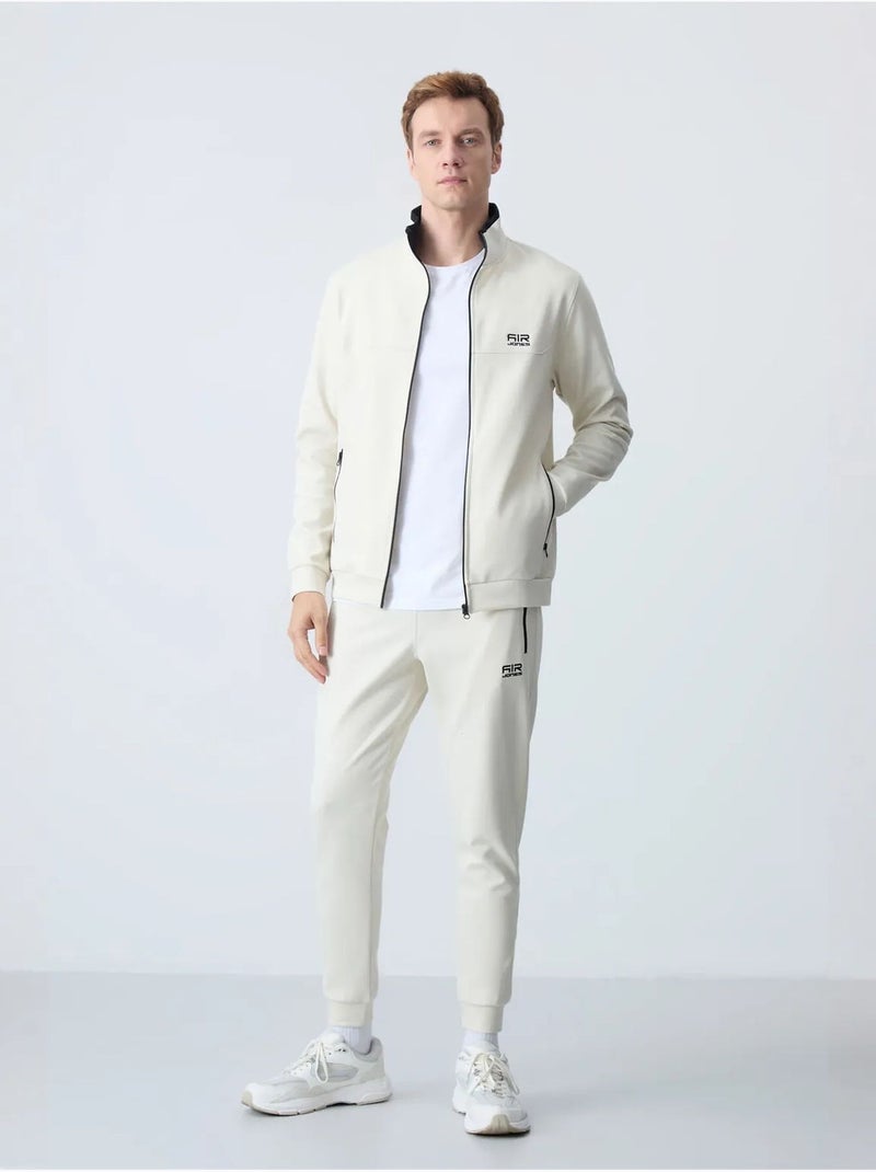 Conjunto de sudadera y pantalón de forro polar para hombre tommy Crema - Kiabi
