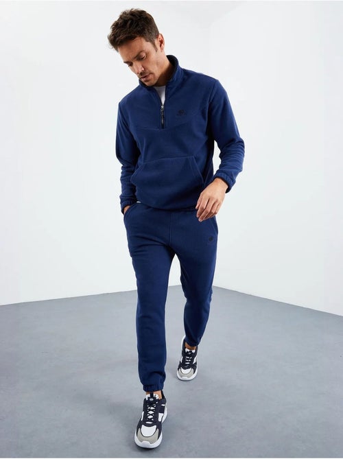 Conjunto de sudadera y pantalón de poliéster para hombre tommy - Kiabi Conjunto de sudadera y pantalón de poliéster para hombre tommy - Kiabi