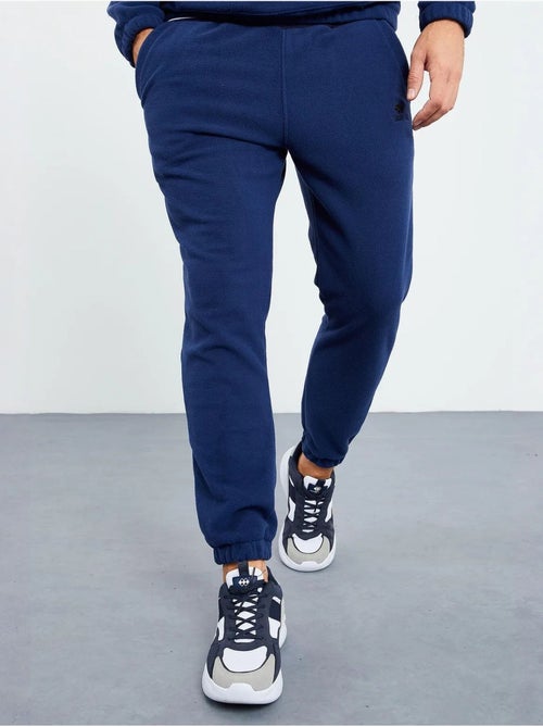Conjunto de sudadera y pantalón de poliéster para hombre tommy - Kiabi Conjunto de sudadera y pantalón de poliéster para hombre tommy - Kiabi