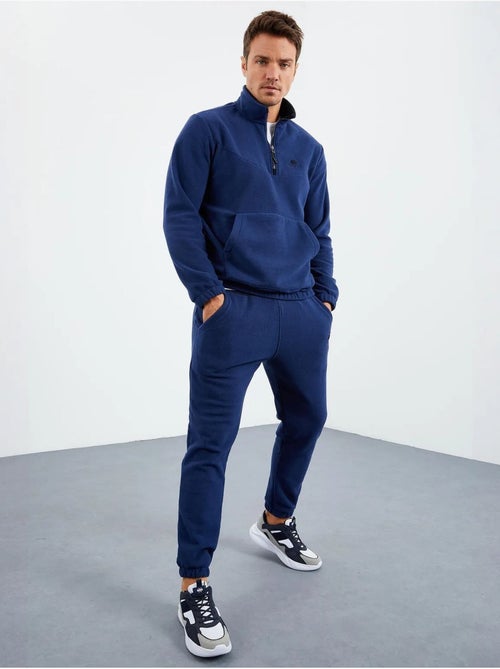 Conjunto de sudadera y pantalón de poliéster para hombre tommy - Kiabi Conjunto de sudadera y pantalón de poliéster para hombre tommy - Kiabi