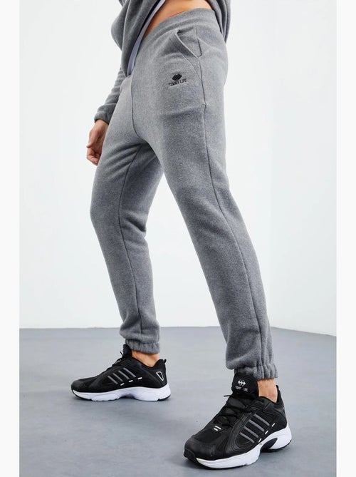 Conjunto de sudadera y pantalón de poliéster para hombre tommy - Kiabi Conjunto de sudadera y pantalón de poliéster para hombre tommy - Kiabi