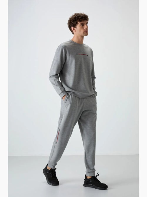 Conjunto de sudadera y pantalón de punto acanalado para hombre tommy - Kiabi Conjunto de sudadera y pantalón de punto acanalado para hombre tommy - Kiabi
