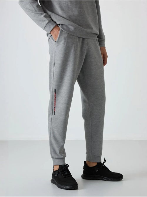 Conjunto de sudadera y pantalón de punto acanalado para hombre tommy - Kiabi Conjunto de sudadera y pantalón de punto acanalado para hombre tommy - Kiabi