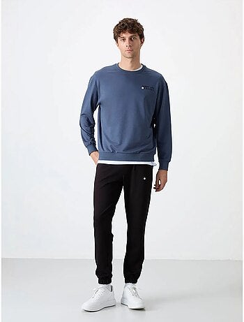 Conjunto de sudadera y pantalón oversize cuello redondo tommy