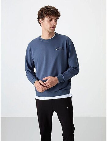 Conjunto de sudadera y pantalón oversize cuello redondo tommy
