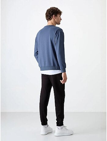 Conjunto de sudadera y pantalón oversize cuello redondo tommy