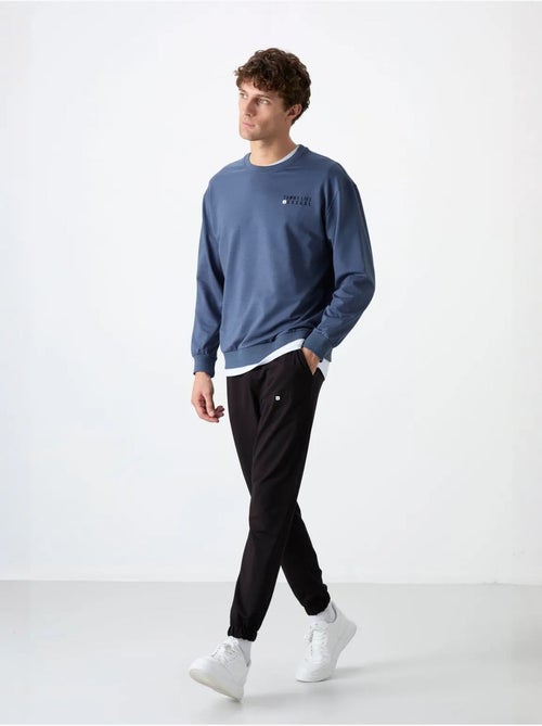 Conjunto de sudadera y pantalón oversize cuello redondo tommy - Kiabi