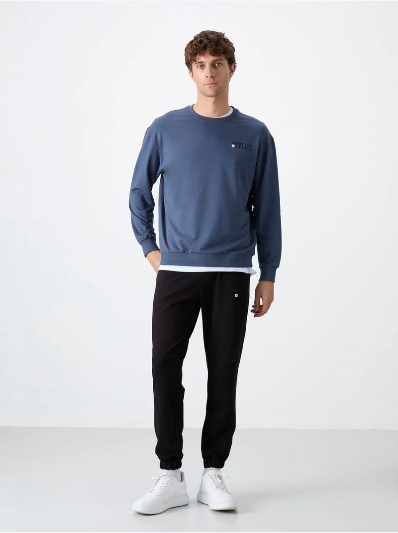 Conjunto de sudadera y pantalón oversize cuello redondo tommy Azul - Kiabi