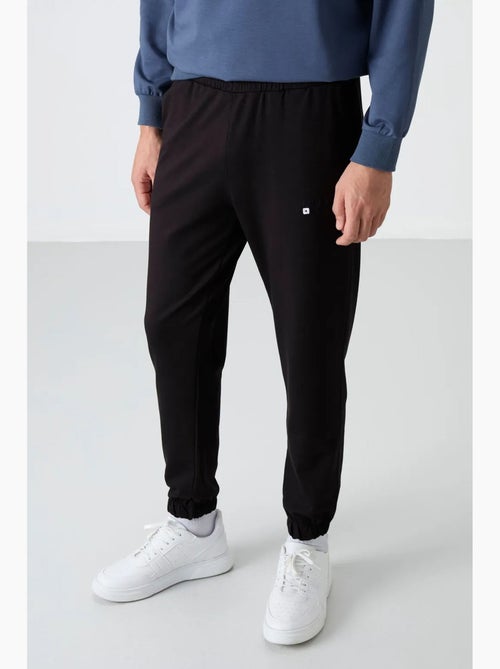 Conjunto de sudadera y pantalón oversize cuello redondo tommy - Kiabi
