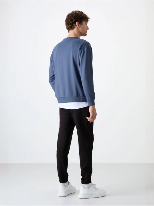 Conjunto de sudadera y pantalón oversize cuello redondo tommy - Kiabi