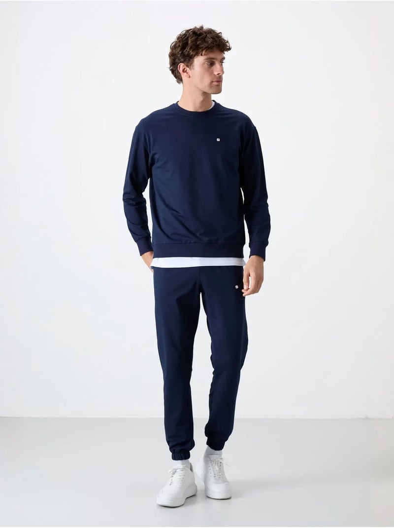 Conjunto de sudadera y pantalón oversize cuello redondo tommy Azul marino - Kiabi