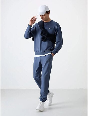 Conjunto de sudadera y pantalón oversize cuello redondo tommy