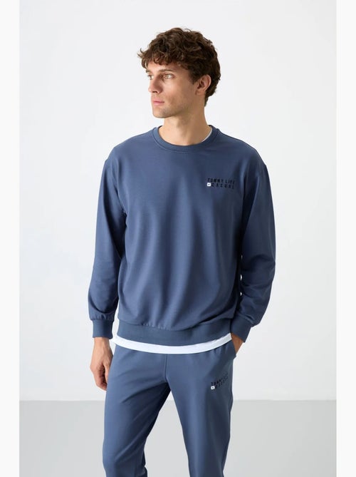 Conjunto de sudadera y pantalón oversize cuello redondo tommy - Kiabi Conjunto de sudadera y pantalón oversize cuello redondo tommy - Kiabi